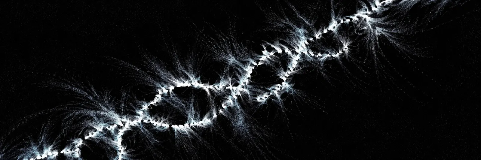 Abstract white particle field on black